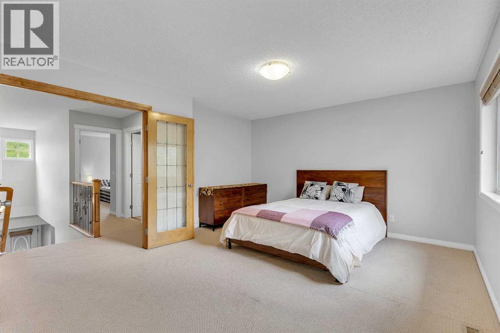 40 Crestmont Way Sw, Calgary, Alberta  T3B 0L6 - Photo 28 - A2224331