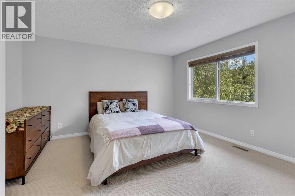 40 Crestmont Way Sw, Calgary, Alberta  T3B 0L6 - Photo 27 - A2224331