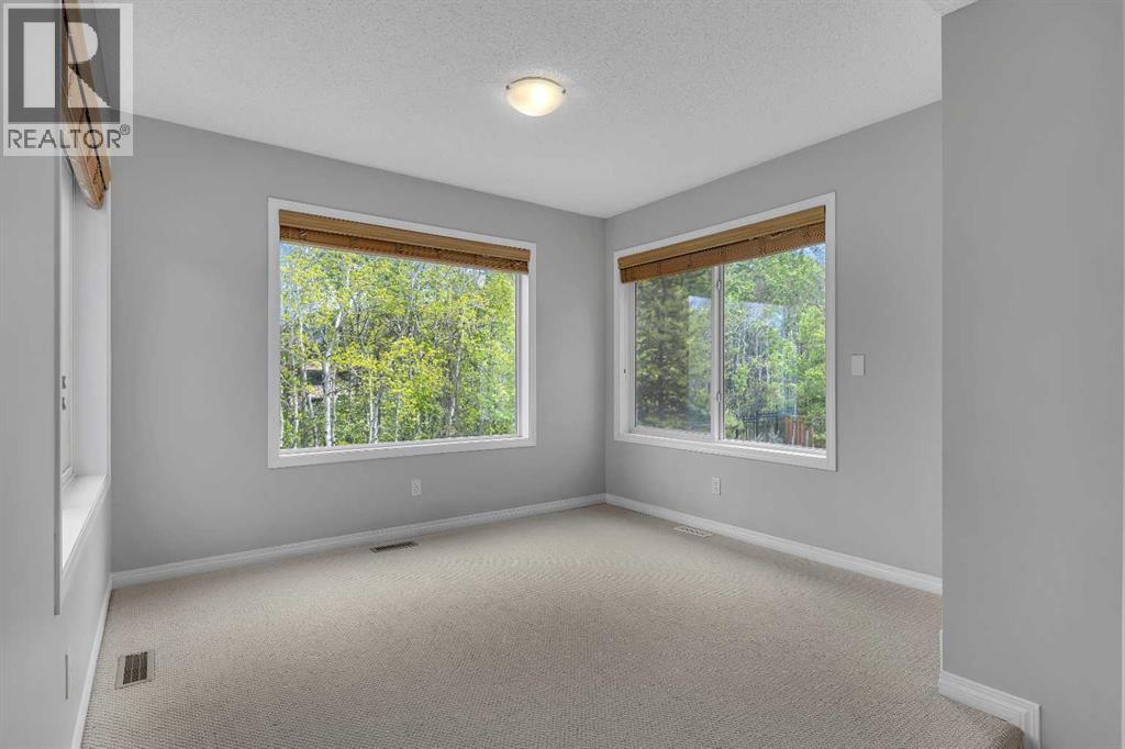 40 Crestmont Way Sw, Calgary, Alberta  T3B 0L6 - Photo 29 - A2224331
