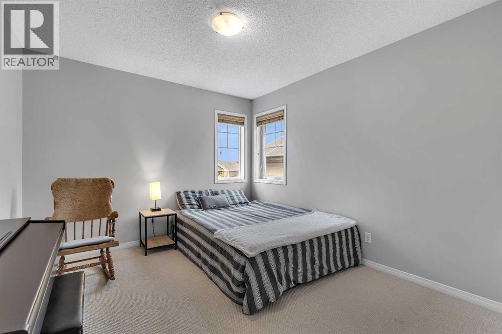 40 Crestmont Way Sw, Calgary, Alberta  T3B 0L6 - Photo 35 - A2224331