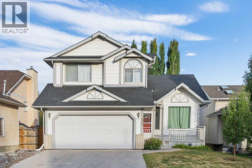 64 Woodmark Crescent Sw, Calgary, Alberta  T2W 4Z2 - Photo 1 - A2262249