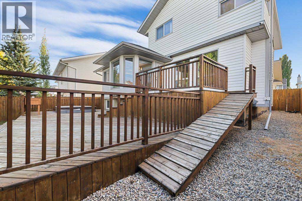 64 Woodmark Crescent Sw, Calgary, Alberta  T2W 4Z2 - Photo 37 - A2262249