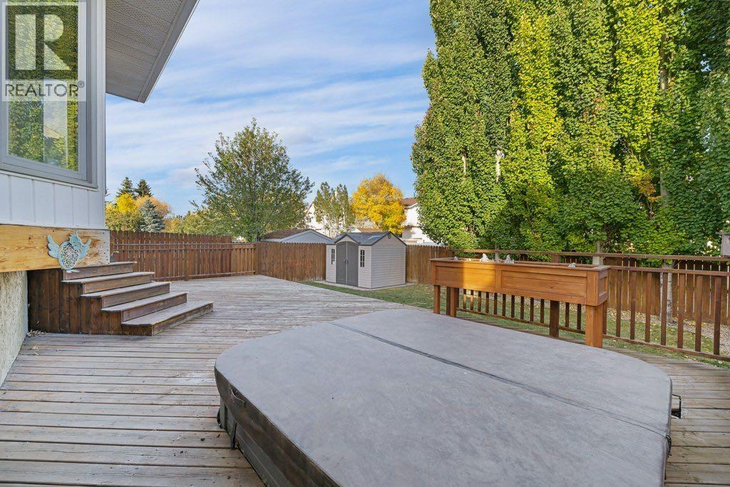 64 Woodmark Crescent Sw, Calgary, Alberta  T2W 4Z2 - Photo 40 - A2262249