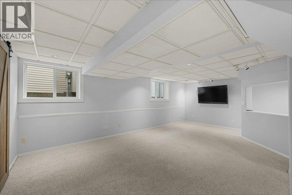 64 Woodmark Crescent Sw, Calgary, Alberta  T2W 4Z2 - Photo 30 - A2262249