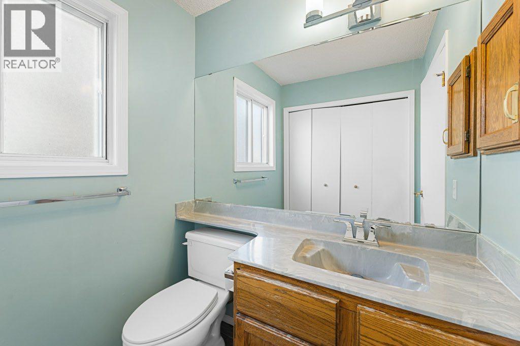 64 Woodmark Crescent Sw, Calgary, Alberta  T2W 4Z2 - Photo 17 - A2262249