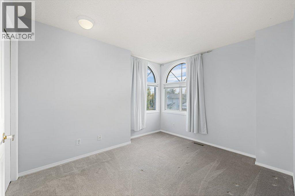 64 Woodmark Crescent Sw, Calgary, Alberta  T2W 4Z2 - Photo 26 - A2262249