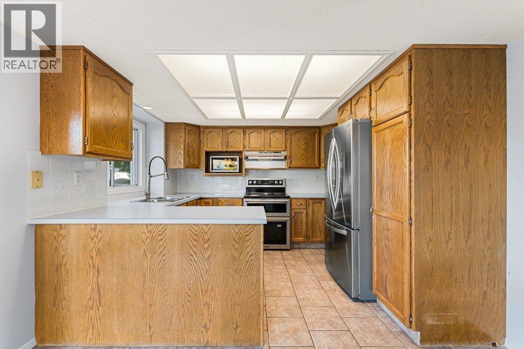 64 Woodmark Crescent Sw, Calgary, Alberta  T2W 4Z2 - Photo 3 - A2262249