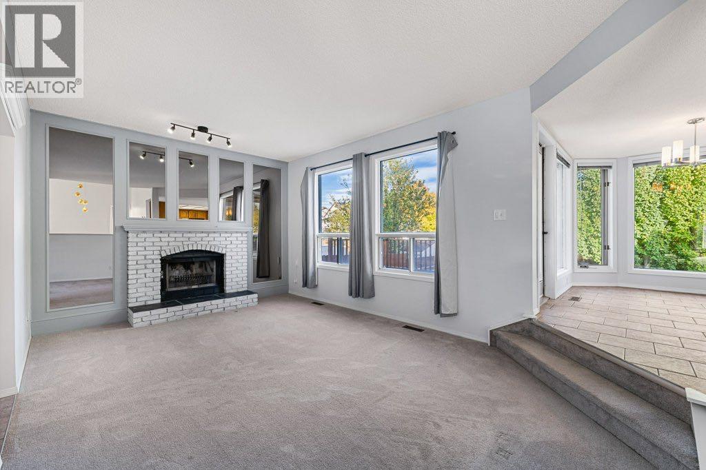 64 Woodmark Crescent Sw, Calgary, Alberta  T2W 4Z2 - Photo 12 - A2262249