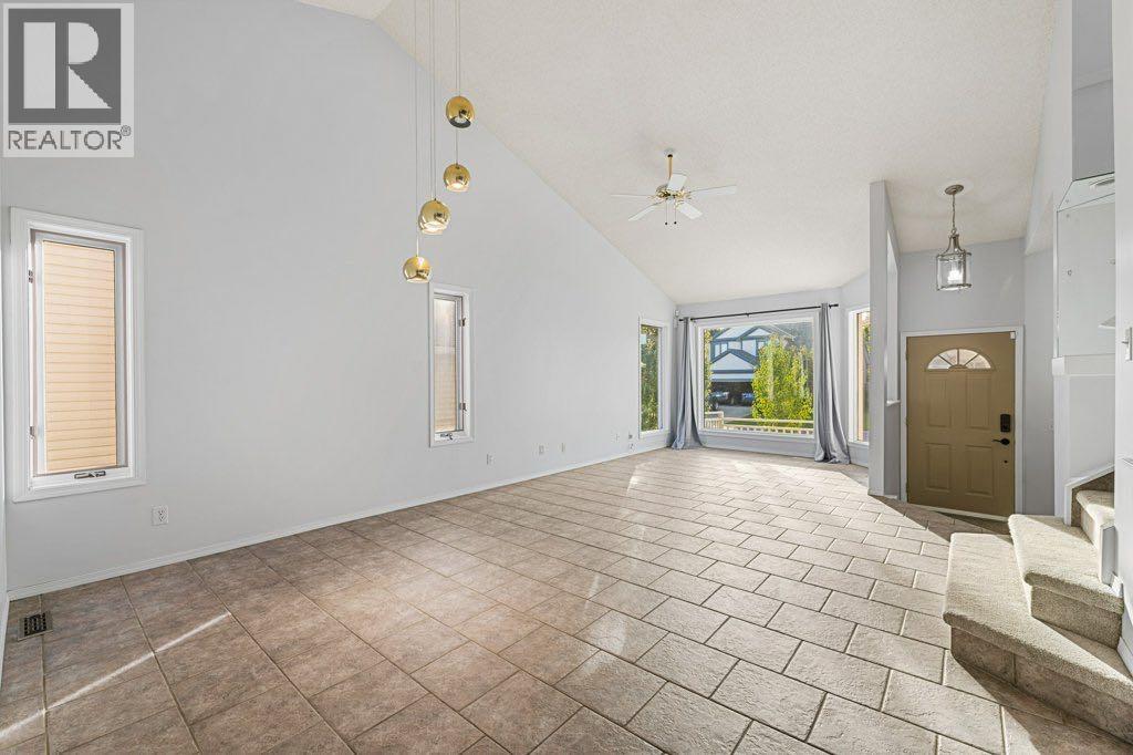 64 Woodmark Crescent Sw, Calgary, Alberta  T2W 4Z2 - Photo 14 - A2262249