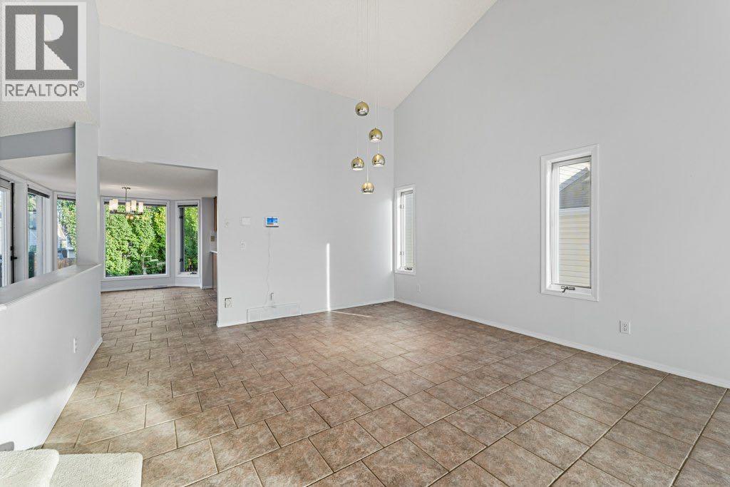 64 Woodmark Crescent Sw, Calgary, Alberta  T2W 4Z2 - Photo 16 - A2262249