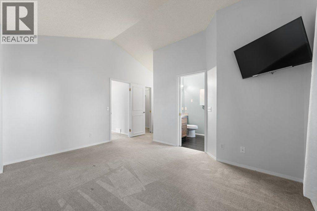64 Woodmark Crescent Sw, Calgary, Alberta  T2W 4Z2 - Photo 20 - A2262249