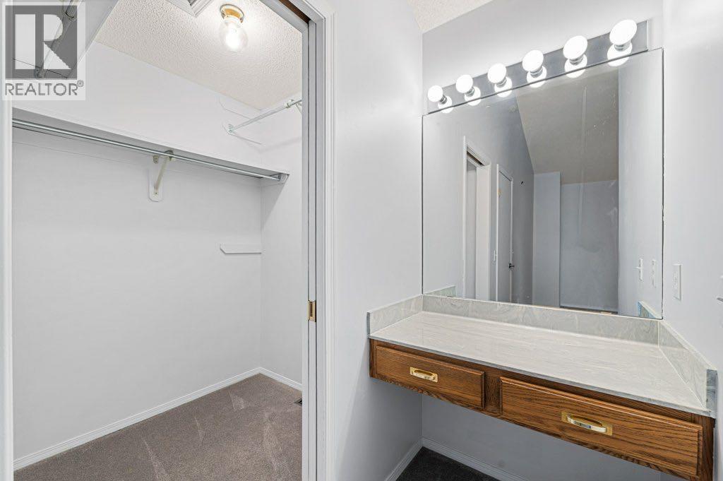 64 Woodmark Crescent Sw, Calgary, Alberta  T2W 4Z2 - Photo 24 - A2262249