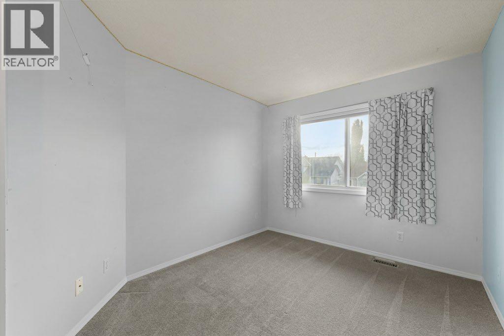 64 Woodmark Crescent Sw, Calgary, Alberta  T2W 4Z2 - Photo 25 - A2262249