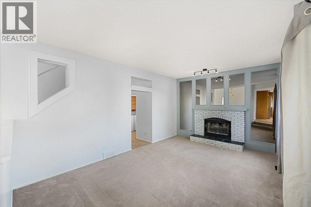 64 Woodmark Crescent Sw, Calgary, Alberta  T2W 4Z2 - Photo 13 - A2262249