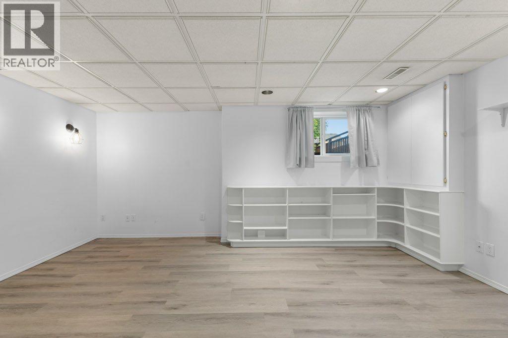 64 Woodmark Crescent Sw, Calgary, Alberta  T2W 4Z2 - Photo 33 - A2262249