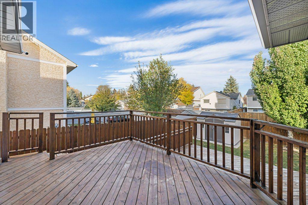 64 Woodmark Crescent Sw, Calgary, Alberta  T2W 4Z2 - Photo 36 - A2262249