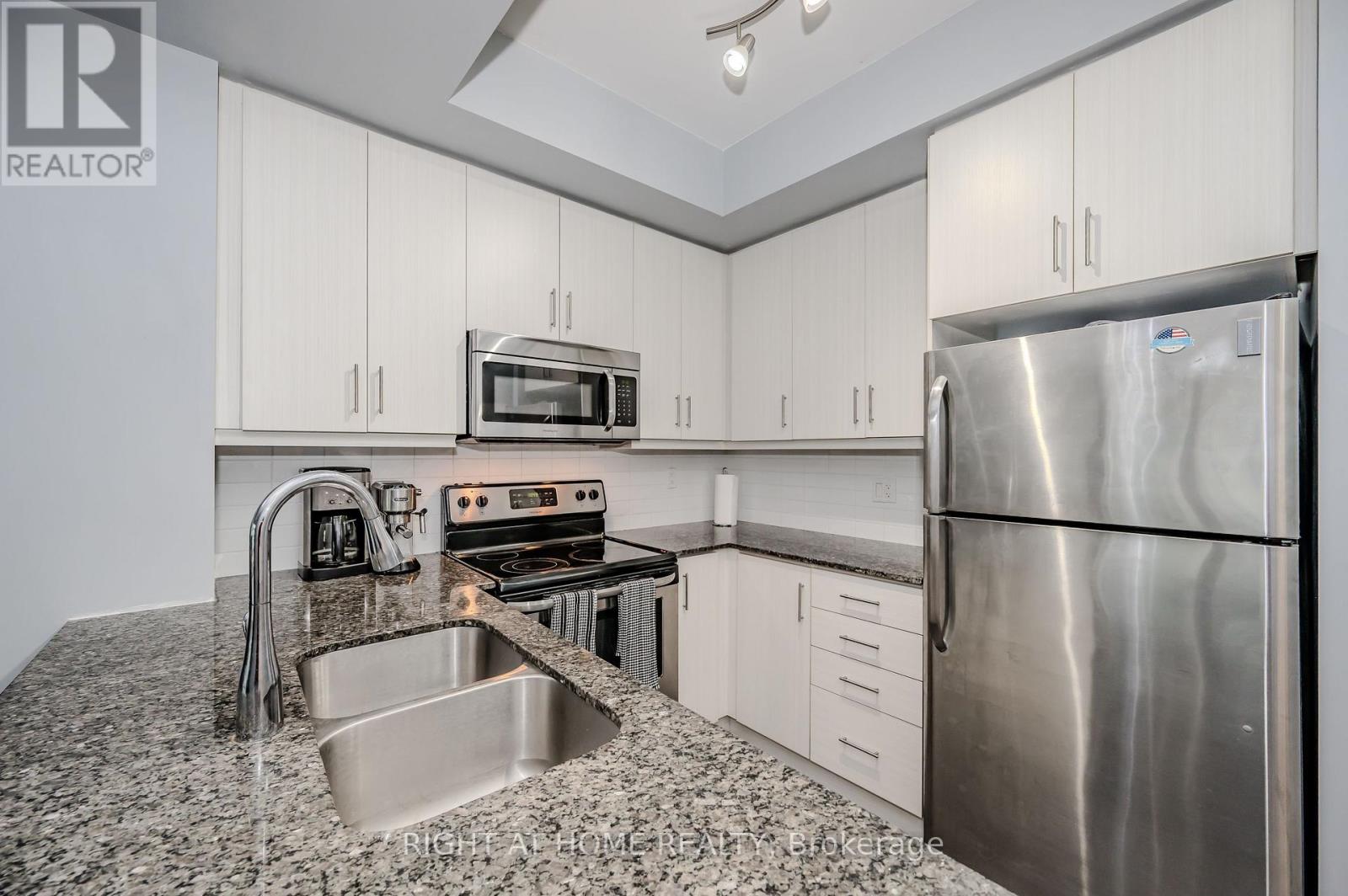 917 - 15 James Finlay Way, Toronto (Downsview-Roding-Cfb), Ontario  M3M 0B3 - Photo 7 - W12448869