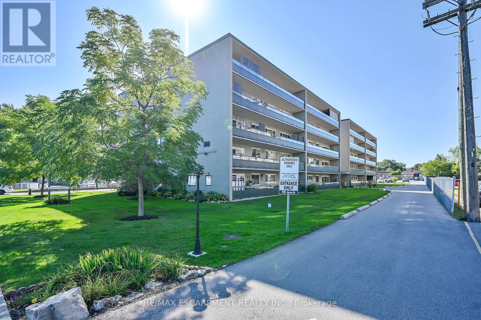 404 - 510 Queenston Road, Hamilton (Corman), Ontario  L8K 1J3 - Photo 1 - X12448851