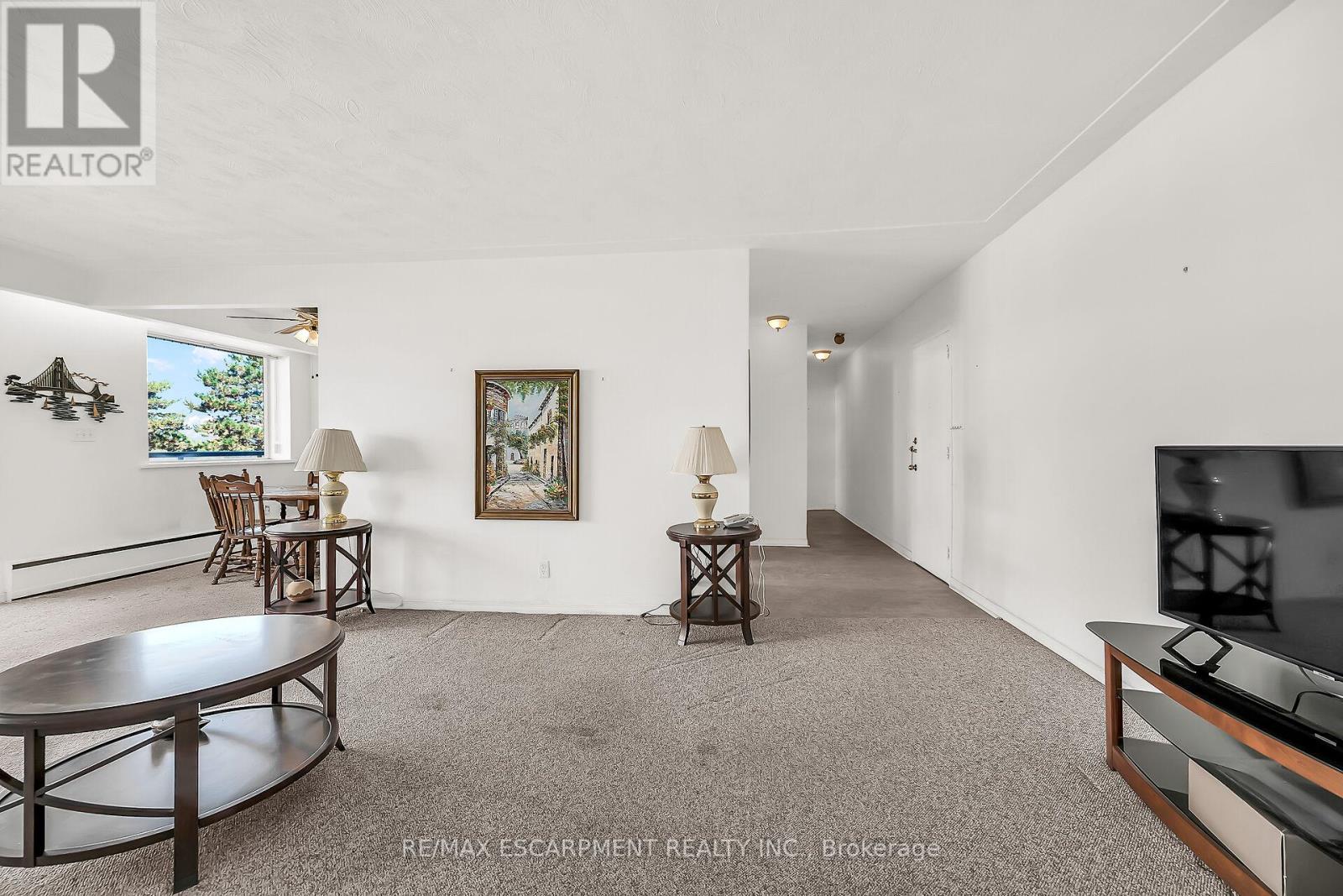 404 - 510 Queenston Road, Hamilton (Corman), Ontario  L8K 1J3 - Photo 10 - X12448851
