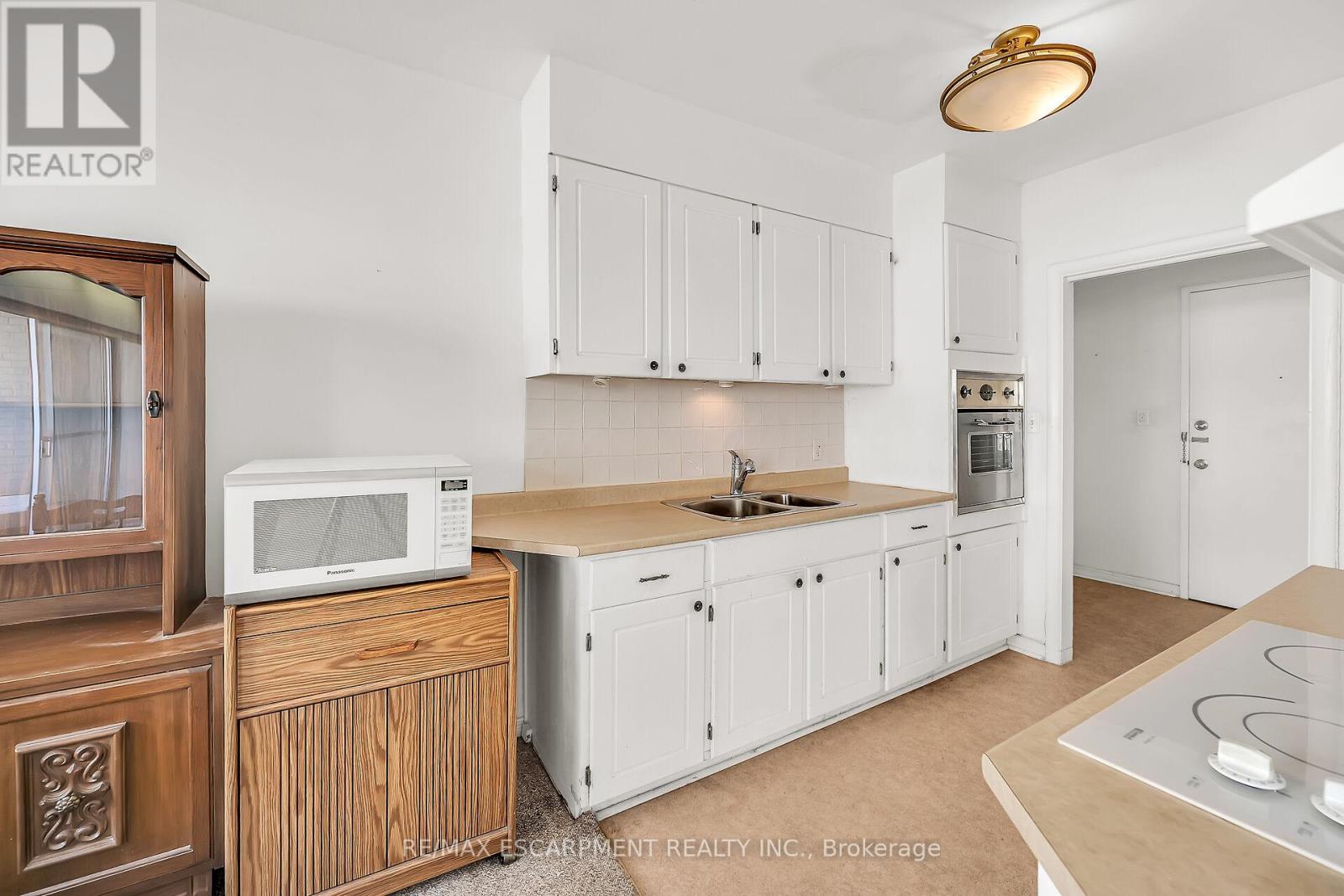 404 - 510 Queenston Road, Hamilton (Corman), Ontario  L8K 1J3 - Photo 20 - X12448851