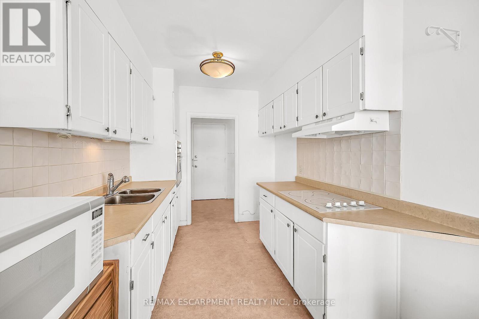 404 - 510 Queenston Road, Hamilton (Corman), Ontario  L8K 1J3 - Photo 21 - X12448851