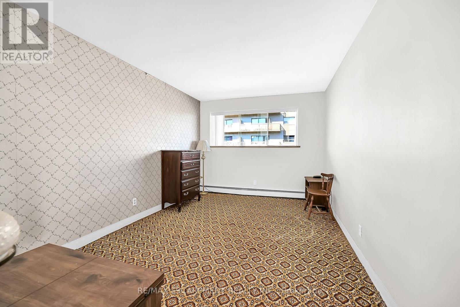 404 - 510 Queenston Road, Hamilton (Corman), Ontario  L8K 1J3 - Photo 27 - X12448851