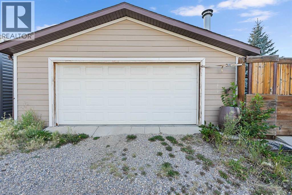 51 Bearberry Bay Nw, Calgary, Alberta  T3K 1R6 - Photo 46 - A2250350