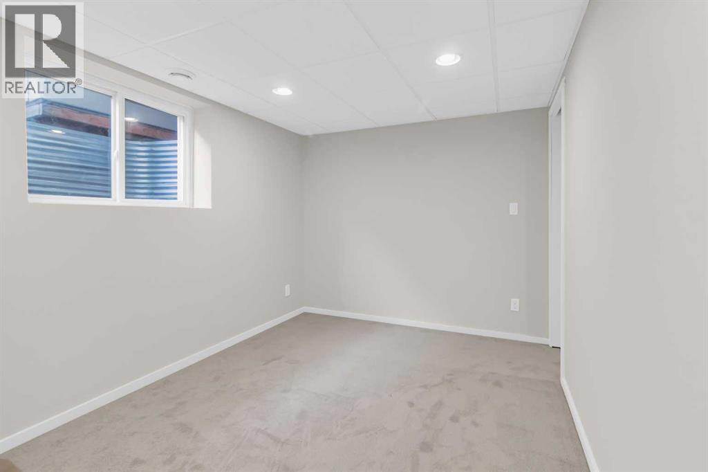 968 Bracewood Rise Sw, Calgary, Alberta  T2W 3C9 - Photo 22 - A2259125