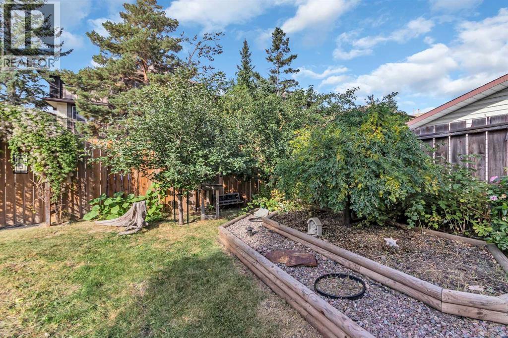 968 Bracewood Rise Sw, Calgary, Alberta  T2W 3C9 - Photo 34 - A2259125