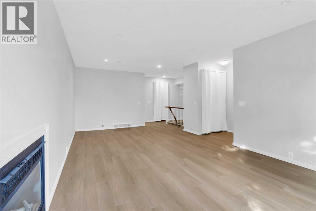 968 Bracewood Rise Sw, Calgary, Alberta  T2W 3C9 - Photo 2 - A2259125