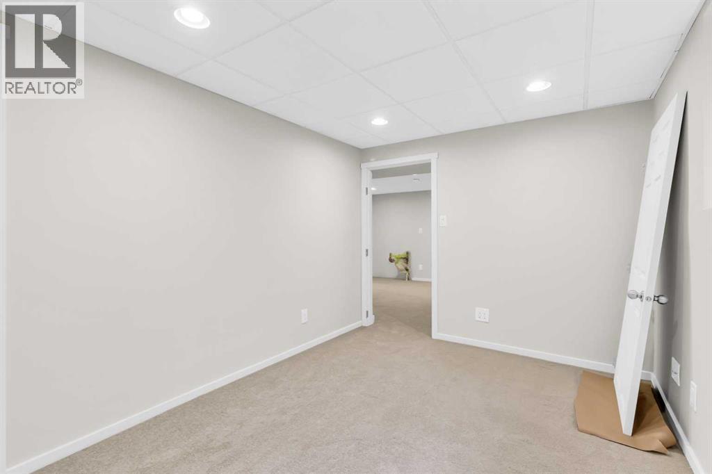 968 Bracewood Rise Sw, Calgary, Alberta  T2W 3C9 - Photo 23 - A2259125