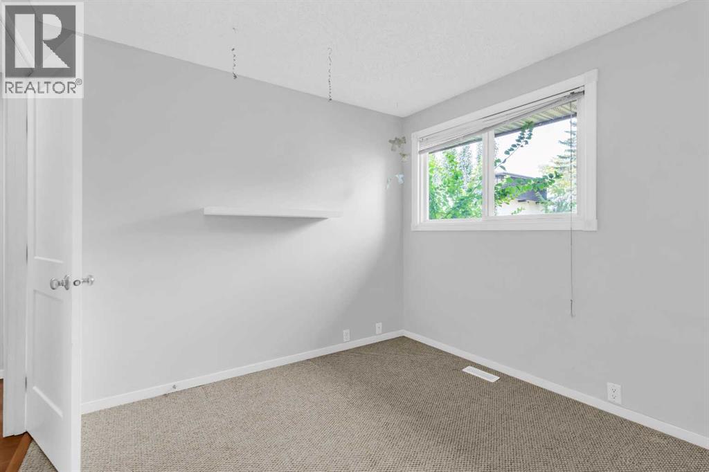 968 Bracewood Rise Sw, Calgary, Alberta  T2W 3C9 - Photo 15 - A2259125
