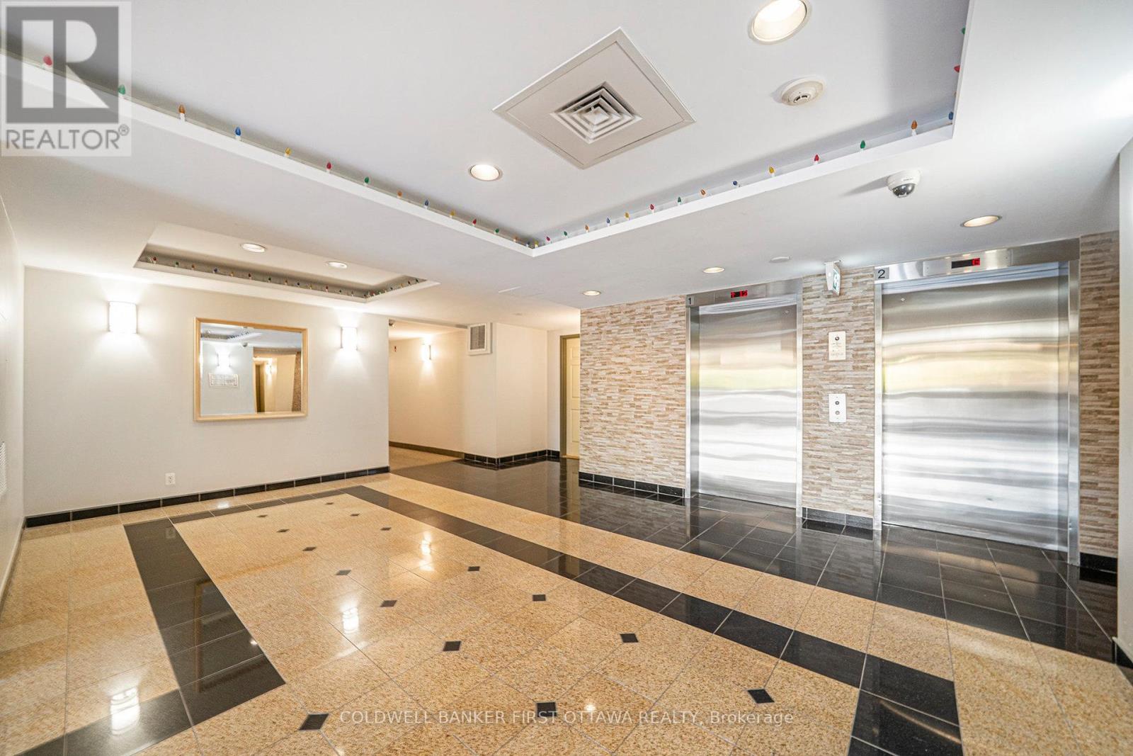 403 - 120 Grant Carman Drive, Ottawa, Ontario  K2E 1C8 - Photo 2 - X12449188
