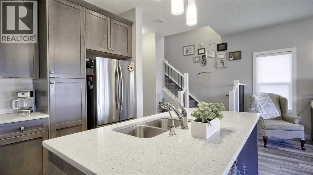 135 Reunion Loop Nw, Airdrie, Alberta  T4B 4J6 - Photo 9 - A2244967