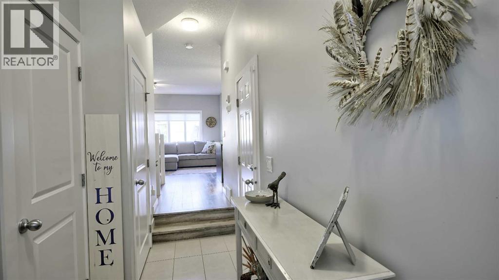135 Reunion Loop Nw, Airdrie, Alberta  T4B 4J6 - Photo 5 - A2244967