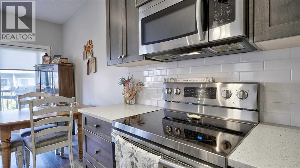 135 Reunion Loop Nw, Airdrie, Alberta  T4B 4J6 - Photo 11 - A2244967