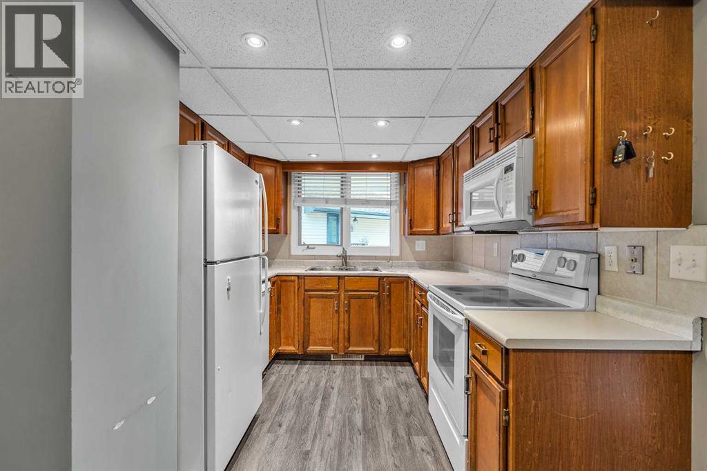 147 Scenic Way Nw, Calgary, Alberta  T3L 1B6 - Photo 7 - A2262120