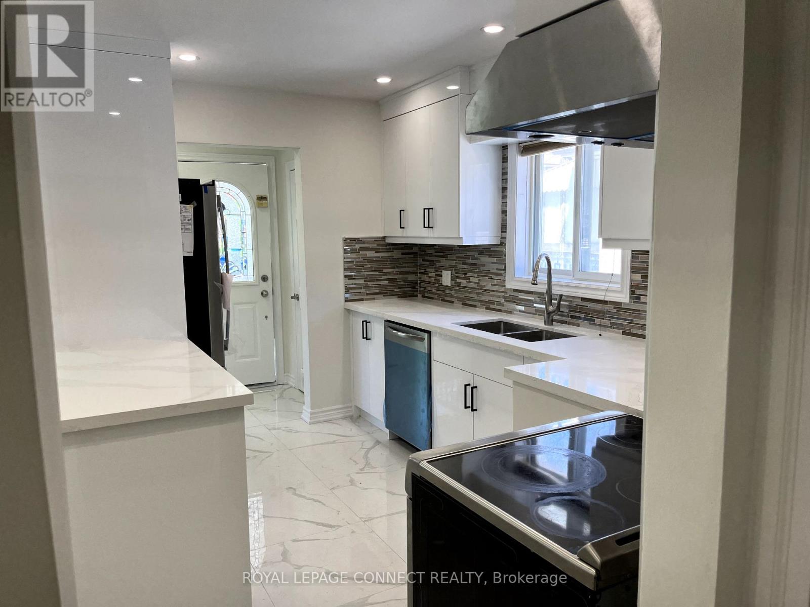 54 Foxrun Avenue, Toronto, Ontario  M3L 1L8 - Photo 3 - W12449143
