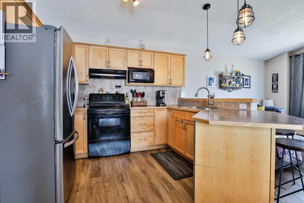 16 Blackfoot Court W, Lethbridge, Alberta  T1K 7P5 - Photo 7 - A2262700