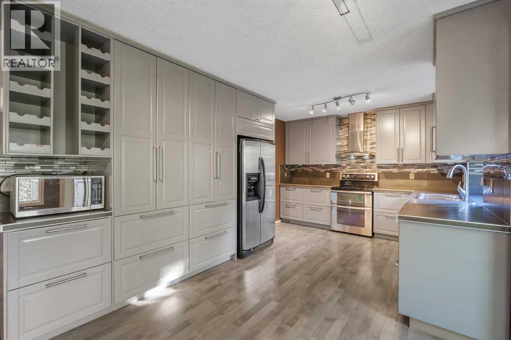 135 Canterbury Court Sw, Calgary, Alberta  T2W 6C1 - Photo 11 - A2261577