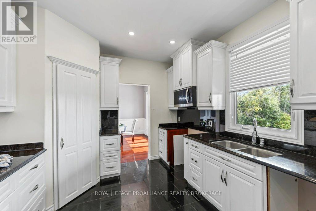 1058 Lucas Road, Loyalist, Ontario  K0H 2H0 - Photo 10 - X12449354