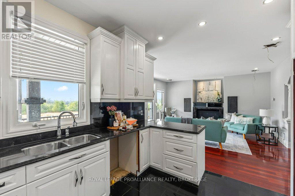 1058 Lucas Road, Loyalist, Ontario  K0H 2H0 - Photo 11 - X12449354