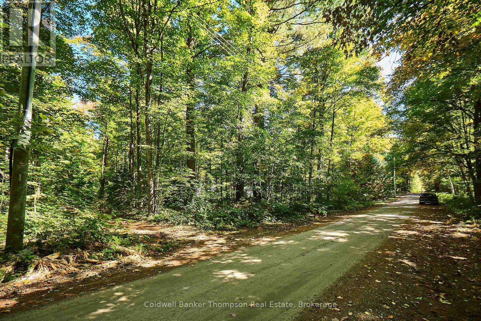 61 Pennys Lane, Huntsville, Ontario  P0B 1M0 - Photo 7 - X12449429