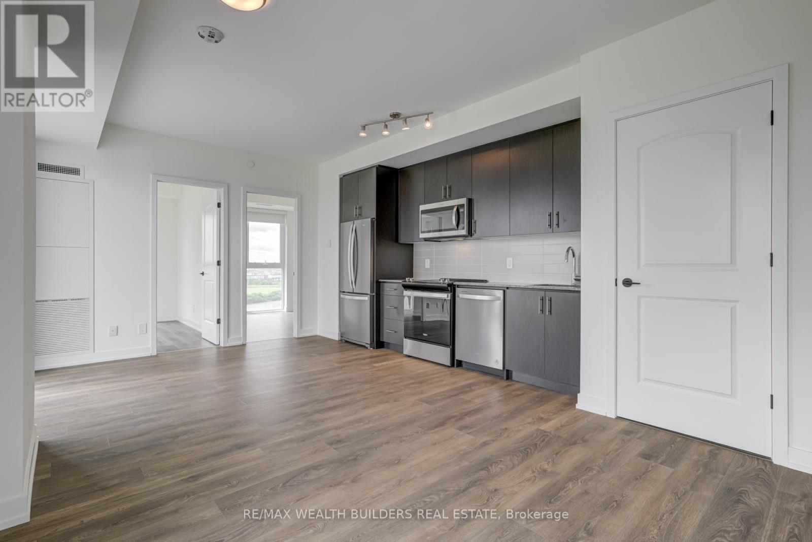 810 - 335 Wheat Boom Drive, Oakville, Ontario  L6H 7C2 - Photo 10 - W12449258