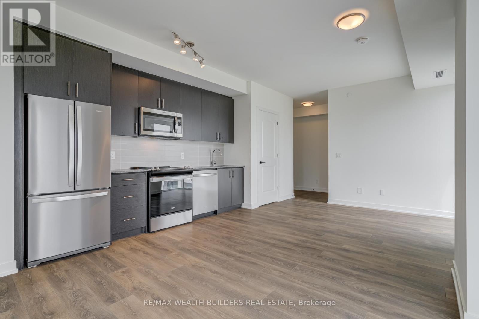 810 - 335 Wheat Boom Drive, Oakville, Ontario  L6H 7C2 - Photo 12 - W12449258