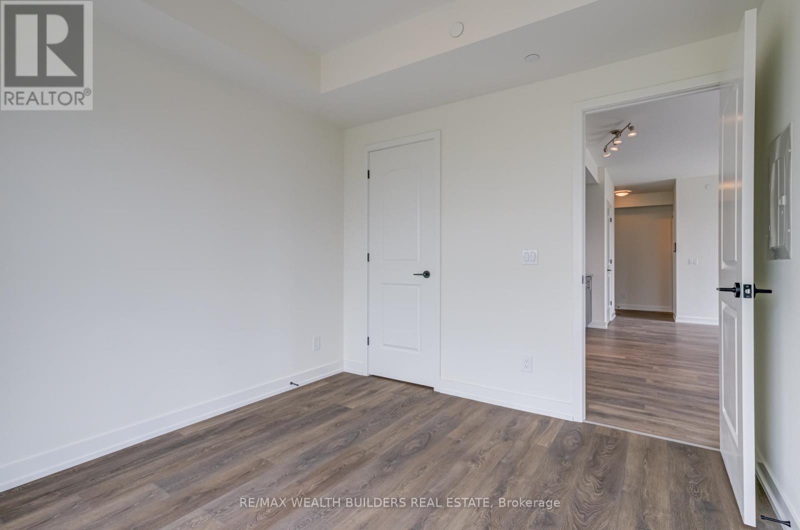 810 - 335 Wheat Boom Drive, Oakville, Ontario  L6H 7C2 - Photo 15 - W12449258