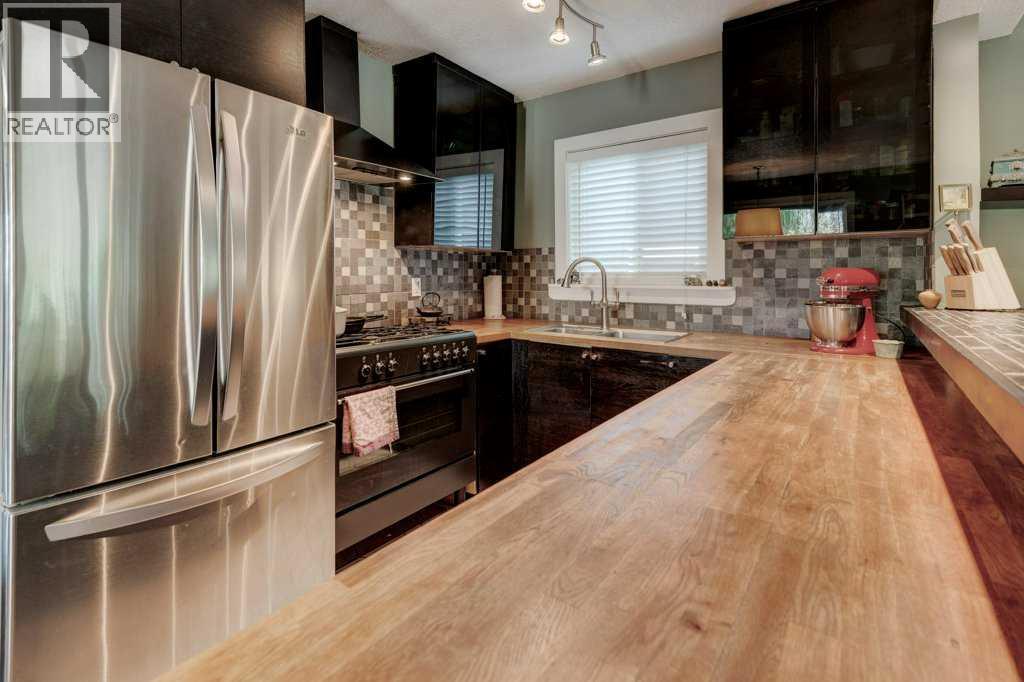 39 Shawglen Place Sw, Calgary, Alberta  T2Y 1X9 - Photo 10 - A2256693