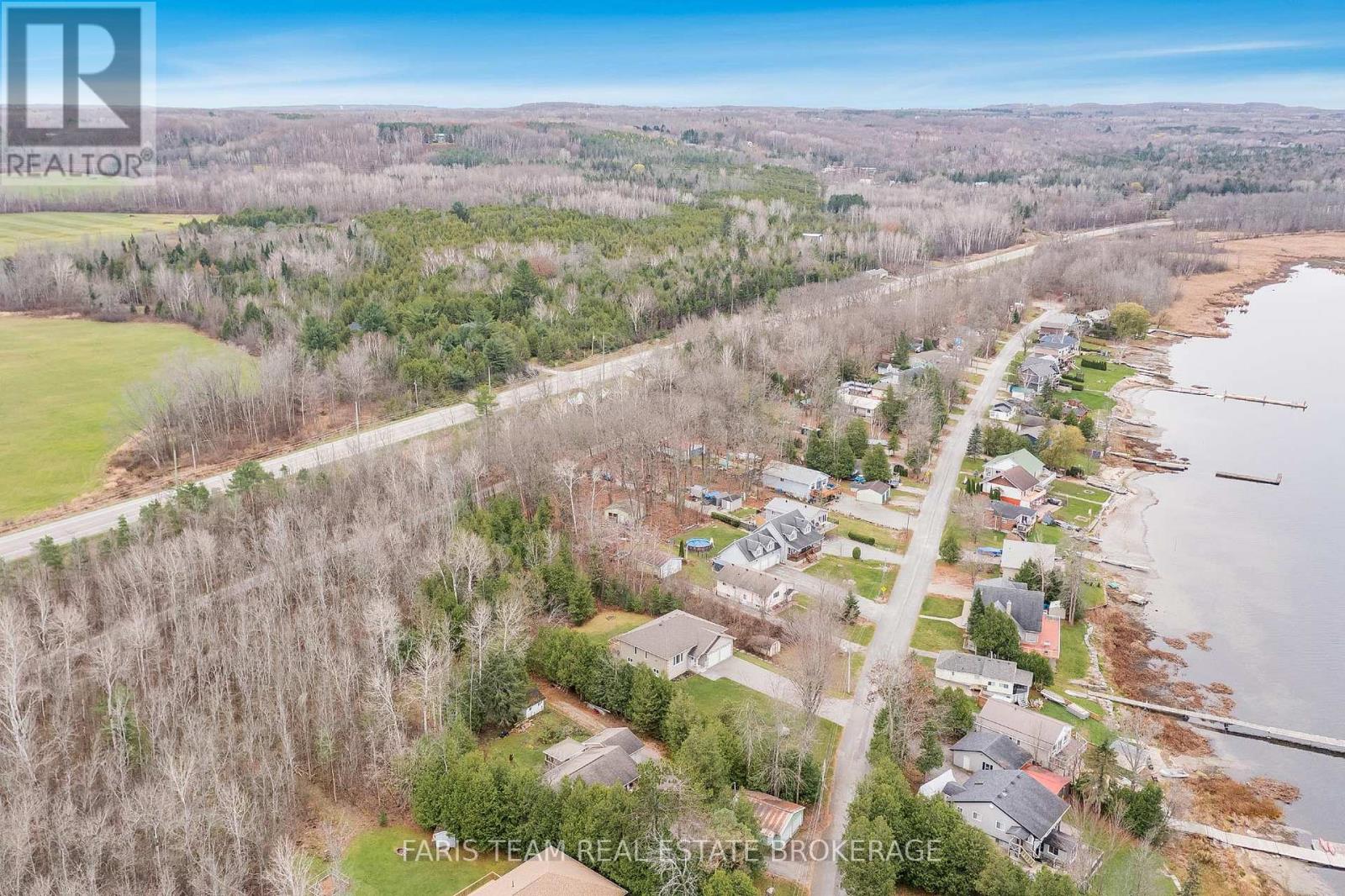 121 Mitchells Beach Road, Tay (Victoria Harbour), Ontario  L0K 2A0 - Photo 3 - S12449369