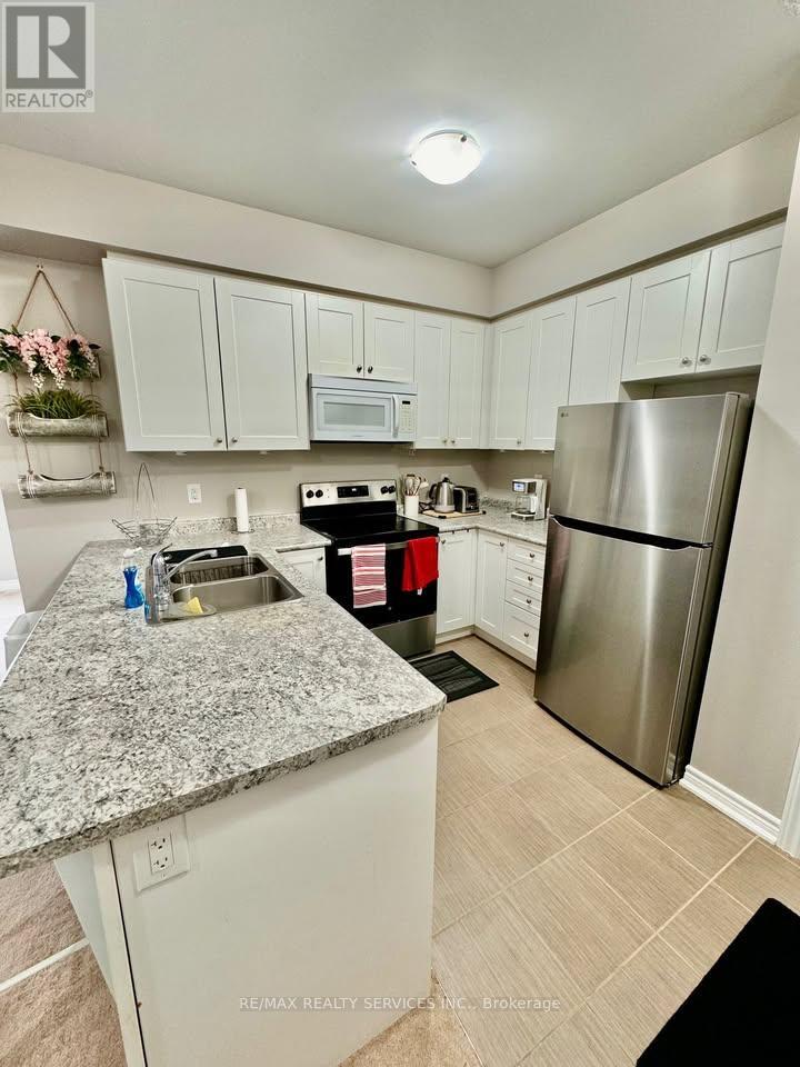 202 - 2339 Sawgrass Drive, Oakville, Ontario  L6H 0L1 - Photo 12 - W12449407