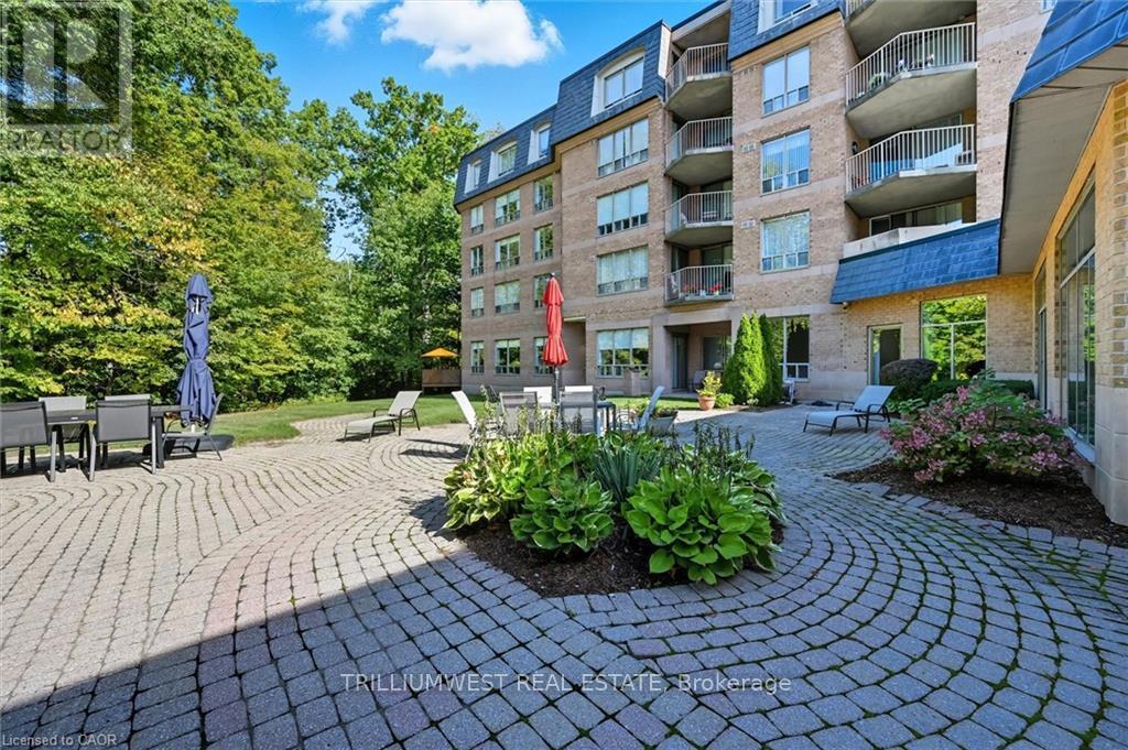 524 - 8111 Forest Glen Drive, Niagara Falls (Mt. Carmel), Ontario  L2H 2Y7 - Photo 2 - X12449545